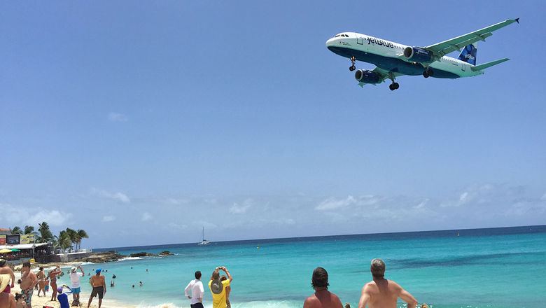 A JetBlue plane in its final approach to Princess Juliana Airport. The airline is just one of many planning to boost service to St. Maarten in the coming months.