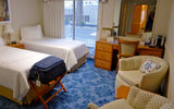 Twin beds in a cabin on the American Eagle.