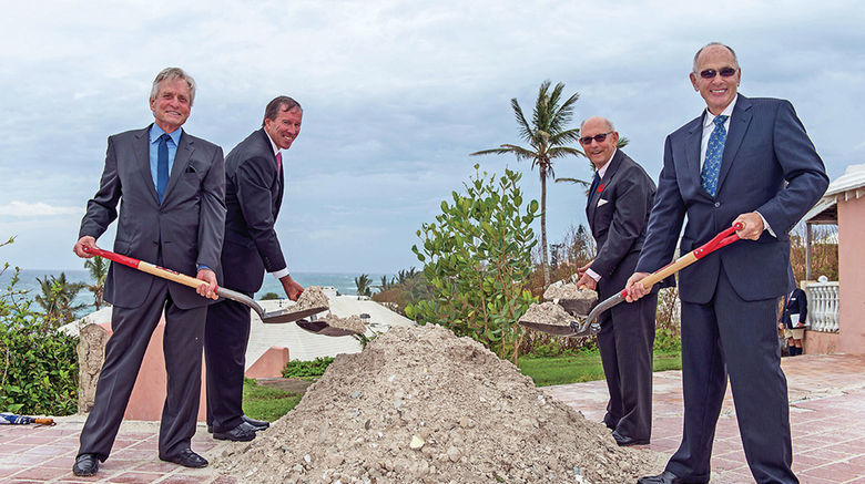 Celebrities looking to get into the lodging business are investing in secluded, largely warm-weather and very natural settings. And while they will be posh and expensive, they will also likely have a decidedly ecological bent. Pictured here, (from left) Michael Douglas, Bermuda Premier Michael Dunkley, Nikki Dill (a relative of Douglas') and Olympic Property Partners' Seth Weinstein at a November 2014 groundbreaking ceremony.