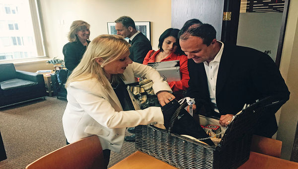 Celebrity Cruises CEO Lisa Lutoff-Perlo and Expedia CruiseShipCenters President Matthew Eichhorst with a picnic basket given to executives at the line’s top accounts. Celebrity Associate Vice President Carol Cabezas looks on. Celebrity Cruises CEO Lisa Lutoff-Perlo and Expedia CruiseShipCenters President Matthew Eichhorst with a picnic basket given to executives at the line’s top accounts. Celebrity Associate Vice President Carol Cabezas looks on.