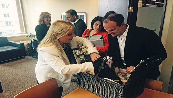 Celebrity Cruises CEO Lisa Lutoff-Perlo and Expedia CruiseShipCenters President Matthew Eichhorst with a picnic basket given to executives at the line’s top accounts. Celebrity Associate Vice President Carol Cabezas looks on. Celebrity Cruises CEO Lisa Lutoff-Perlo and Expedia CruiseShipCenters President Matthew Eichhorst with a picnic basket given to executives at the line’s top accounts. Celebrity Associate Vice President Carol Cabezas looks on.