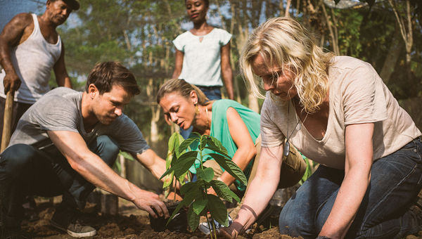 Fathom travelers help out at a cacao nursery in the Dominican Republic. Fathom travelers help out at a cacao nursery in the Dominican Republic.