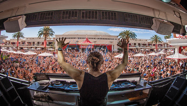 Celebrity DJ David Guetta at Encore Beach Club, which transforms into Surrender nightclub after sunset. Celebrity DJ David Guetta at Encore Beach Club, which transforms into Surrender nightclub after sunset.