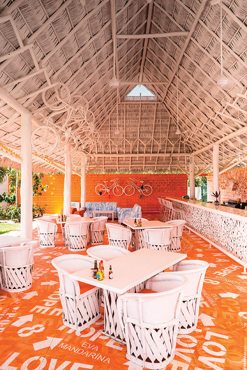 A shuttle takes travelers from the main hotel to the town of La Cruz, where the hotel owns Eva Mandarina Beach Club. A shuttle takes travelers from the main hotel to the town of La Cruz, where the hotel owns Eva Mandarina Beach Club.