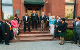 A “vine-cutting ceremony” was conducted at the Ivy Hotel, a 19th century mansion-turned-hotel near Baltimore’s Inner Harbor. Among those in attendance for the event were, from left, Rep. Elijah Cummings (D-Md.); Bernard C. “Jack” Young, president of the Baltimore City Council; Ivy Hotel owners Sylvia Brown, Jennifer Brown and Eddie Brown; hotel Managing Director David Garrett; owners Marty Azola, Kirsten Azola, Lone Azola and Tony Azola; Baltimore Mayor Stephanie Rawlings-Blake; and Ivy Hotel General Manager Rob Arthur.