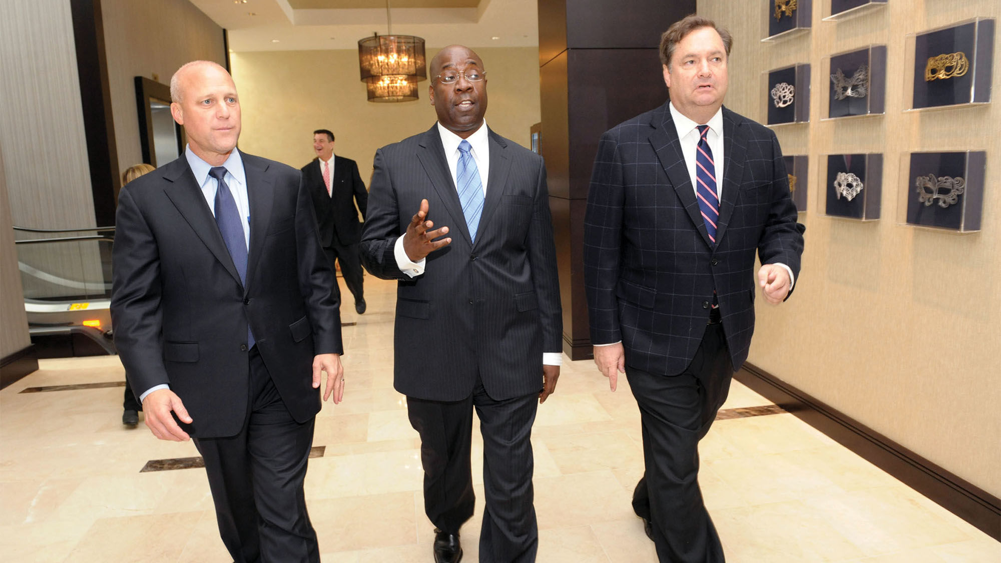 From left, New Orleans Mayor Mitch Landrieu, Hyatt Regency New Orleans General Manager Michael Smith and New Orleans Convention and Visitors Bureau CEO Stephen Perry at the Hyatt Regency’s reopening day in 2011.