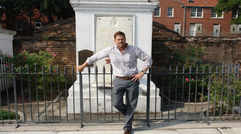 Photographer Morgan McCall Molthrop is one of many native New Orleanians who decided to return to the city after Hurricane Katrina. In his case, he co-founded a local tour business. Pictured here, Molthrop in front of the Tomb of French Creole Nobleman Bernard de Marigny in New Orleans' St. Louis Cemetery Number 1. A selection of his photos follow.