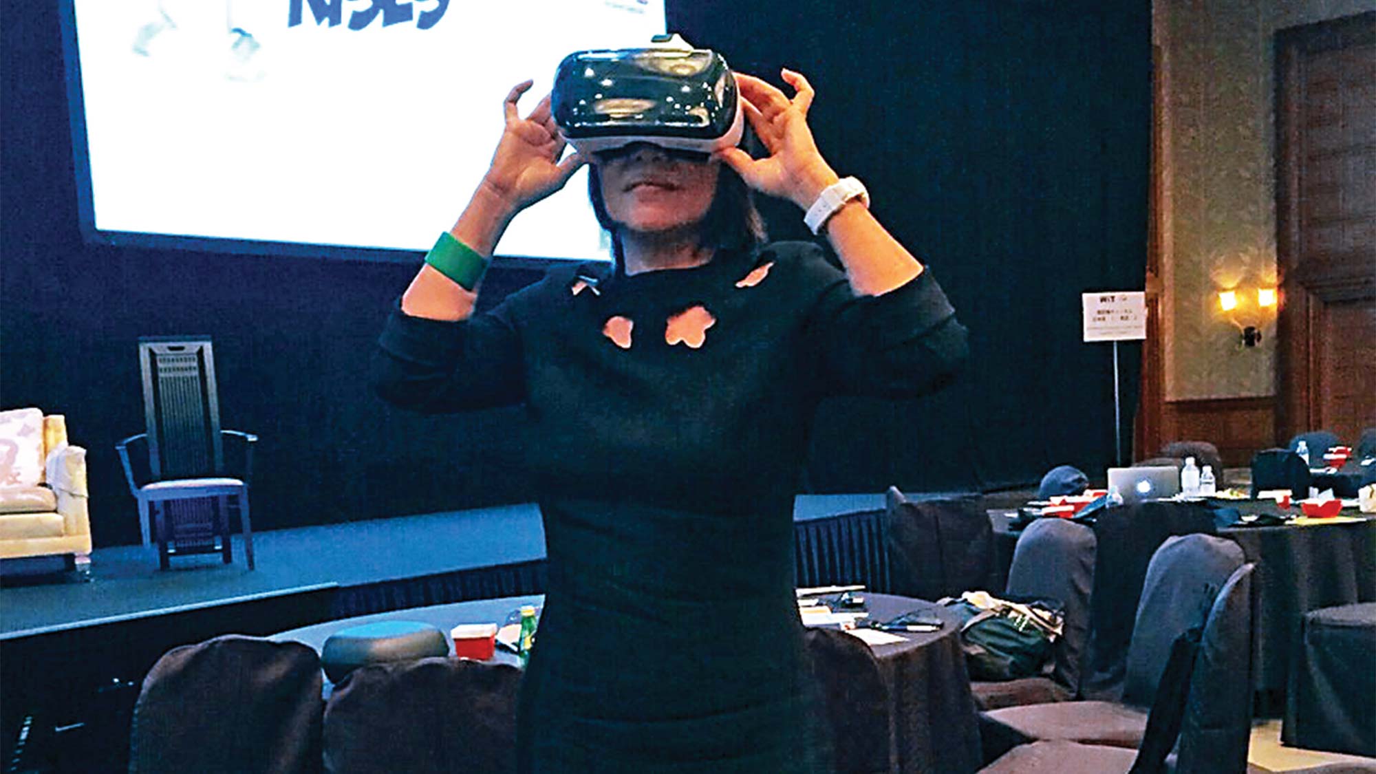 Yeoh Siew Hoon in virtual reality mode on the Samsung Gear VR headset powered by Oculus.