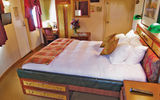 The cabins on coastal cruise ships tend to be small and cozy, like this one on the Legacy.