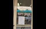 A sign on a door in Whitefish, Mont., makes a plea for shoppers to help keep a shop smoke-free.