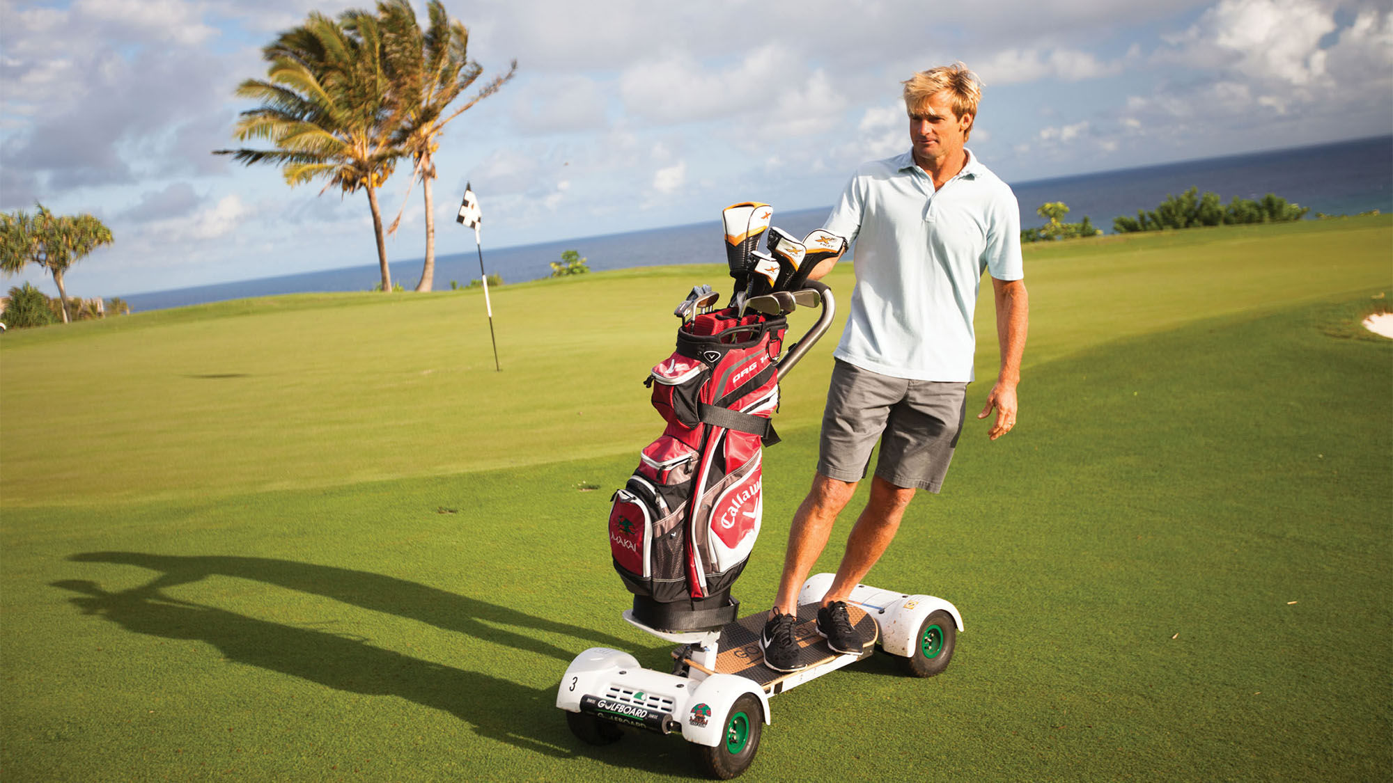 Surfer Laird Hamilton on a GolfBoard at the Princeville Makai Golf Course on Kauai.
