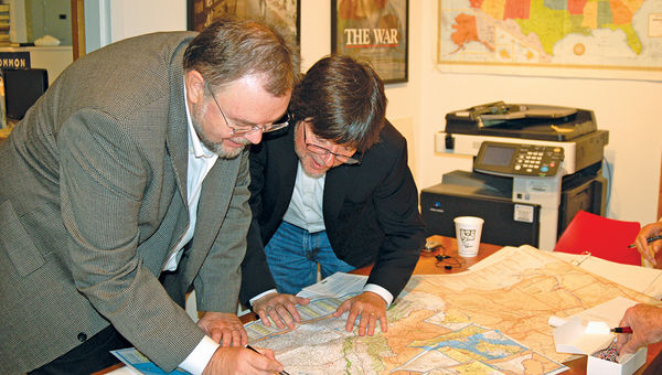 Filmmaker Ken Burns, right, and Tauck's North America product manager, Roger Saterstrom, plan an itinerary. Filmmaker Ken Burns, right, and Tauck's North America product manager, Roger Saterstrom, plan an itinerary.