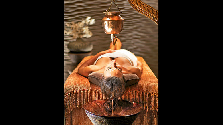 With a thriving spa industry, revamped menus and other initiatives, Las Vegas is focusing on offering healthy options amid its famed excess. Pictured here, a Shirodhara scalp treatment can be added to a massage at Caesars Palace's Qua Baths & Spa.