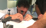 Visitors can take a watchmaking lesson and actually make a watch while in La Chaux-de-Fonds. Above, Travel Weekly Editor in Chief Arnie Weissmann assembles a watch, guided by a local instructor.