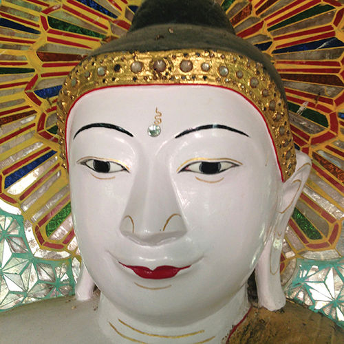 A close-up of one of the buddhas. A close-up of one of the buddhas.