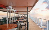 A rendering of the Waterfront, an indoor/outdoor area of restaurants and bars that helps connect cruisers on the Norwegian Escape to the ocean.