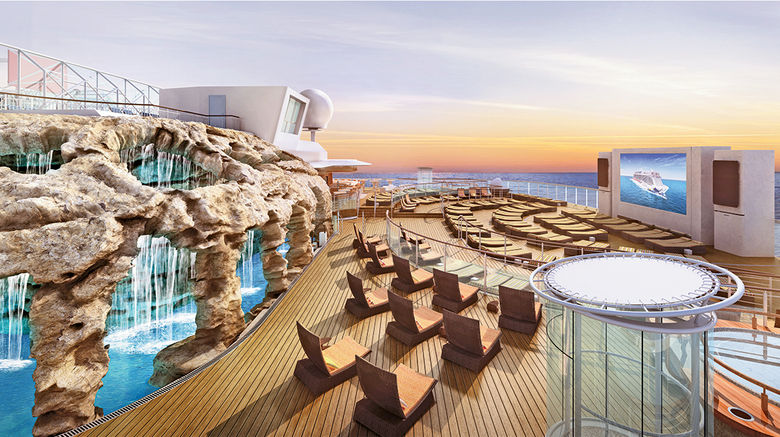 With some 40 new ships set to be delivered in the next five years, cruise lines are vying to outdo each other with design innovations to differentiate their vessels. Pictured here, a waterfall grotto has been added to the Spice H2O nightclub area on the Norwegian Escape to help with the distribution of passengers around the ship.