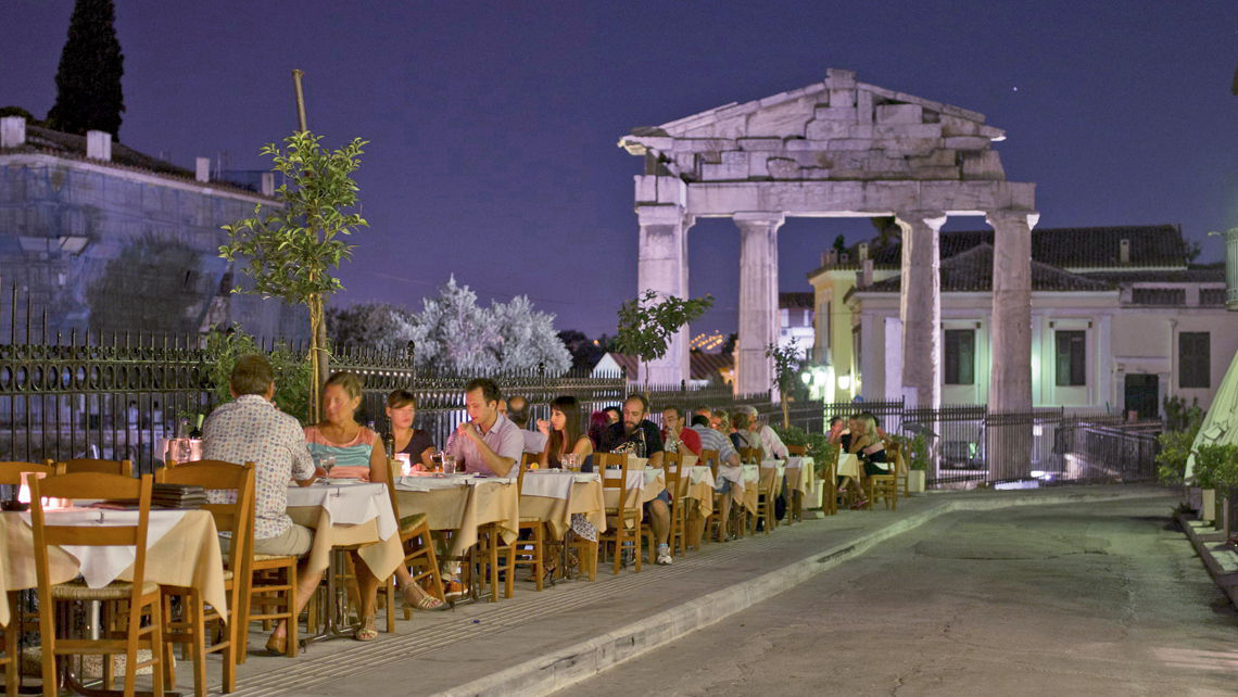 Alfresco dining in Athens. The EU is recommending that member countries reinstate restrictions for U.S. visitors, based on recent Covid numbers.