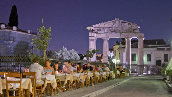 A restaurant in Athens' Plaka neighborhood, one of the city's most popular for alfresco evening dining. A restaurant in Athens' Plaka neighborhood, one of the city's most popular for alfresco evening dining.