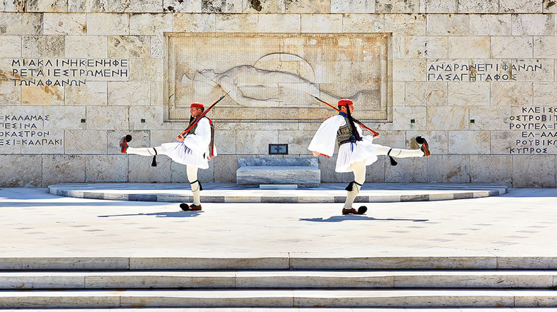 From Athens' ancient cultural icons to the cuisine of the Peloponnese peninsula and the serenity of the Aegean islands, Greece's tourism numbers are booming. Pictured here, the changing of the guard, as seen from the Hotel Grand Bretagne, which is centrally located on Syntagma (Constitution) Square.