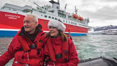 G Adventures guests on a Zodiac from the Expedition ship in the Arctic.