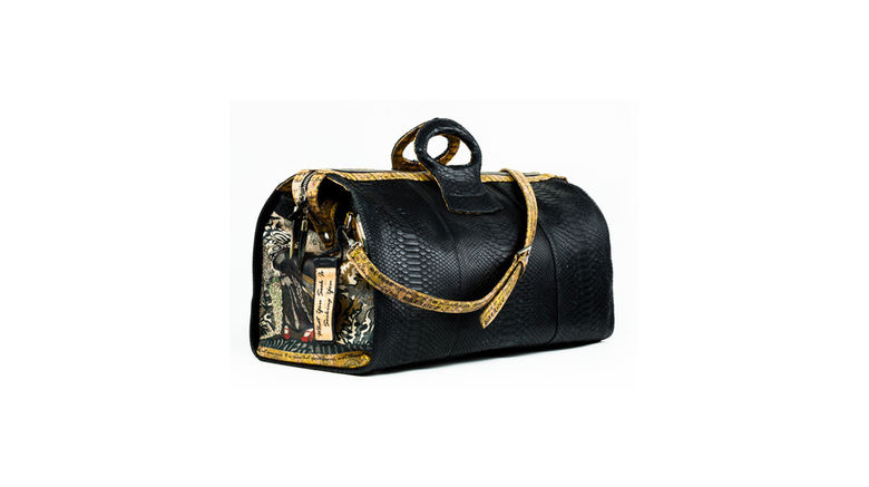 What's New, What's Hot is Travel Weekly's look at useful and fun travel gadgets, edited by Joe Rosen. First up, the Lady Teresa duffel. One of a unique line of handmade bags from designer Zahyly Heravi's Freedom 24, whose line of products is crafted with original paintings, amulets and exotic skins. Designed and handcrafted in the U.S., the duffel is as much a work of art as it is a practical carryall. To be sure, this is a high-end product for consumers willing to pay the price for high-end quality.