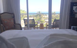 An oceanfront king balcony at the Nautilus, where the bed faces the balcony.