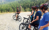 The Weissmanns prepare to set out with a guide for a 15-mile mountain-bike ride from the ghost town of Garnet back to the ranch.