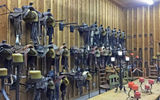 The tack room of the Saddle Club, where horses are boarded and rodeos held, is also used as a dining room for corporate events.