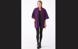Janska is offering this functional and comfortable wrap that will make a perfect travel accessory on planes, trains and in hotels. Made of machine-washable fleece that is at once warming and light weight, the Reader's Wrap product has pockets to hold books, reading glasses or a cell phone. The wrap's design incorporates a shawl collar and a 20-inch back drape that lies flat for comfort. It comes in black, ocean (blue), red and crocus (purple).