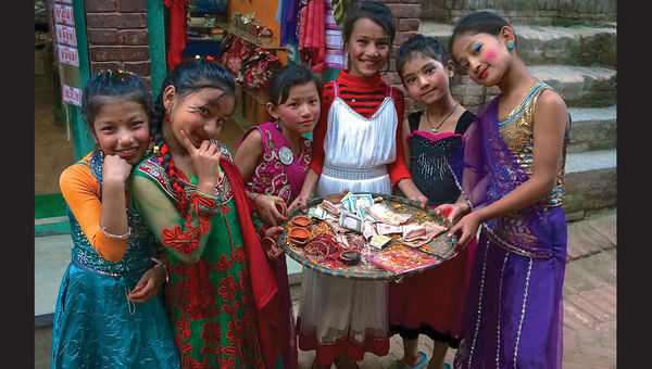 Young girls in Bhaktapur, dressed for Diwali, Goddess Laxmi's Festival of Light. Young girls in Bhaktapur, dressed for Diwali, Goddess Laxmi's Festival of Light.