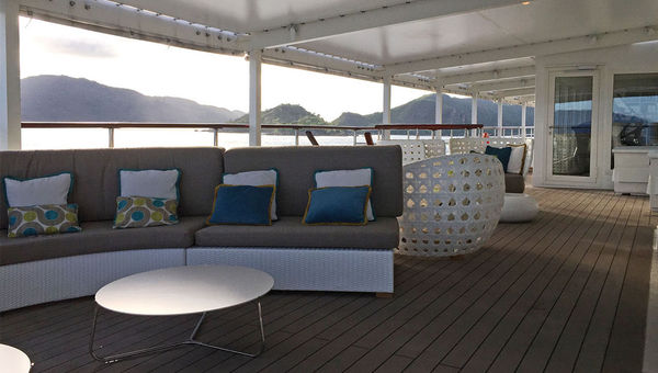 The ship’s Sunset Bar is outside but covered by a canopy.