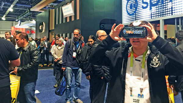 An attendee checks out the YouVisit VR experiences at the Consumer Electronics Show. An attendee checks out the YouVisit VR experiences at the Consumer Electronics Show.