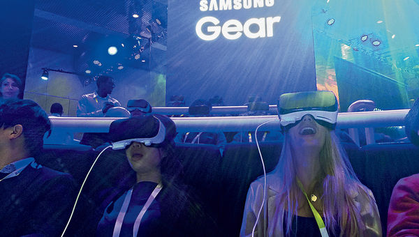 Conference goers are thrilled by the Samsung Gear VR roller coaster at CES. Conference goers are thrilled by the Samsung Gear VR roller coaster at CES.