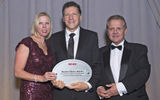 Travel Weekly's Arnie Weissmann, center, with Kimberly Daley and Jack Richards of Pleasant Holidays.