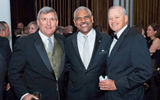 Arnold Donald of Carnival Corp., center, with Bob Sullivan, left, and Jay Nelson of Travel Weekly.