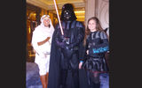 The Slater family, Kara, Matt and 10-year-old Kathan, of from Rainsville, Ala., dressed up as Rey, Darth Vader and Darth Vader.