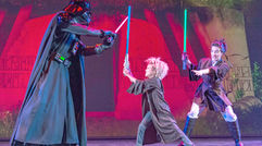 During Disney Cruise Line's first Star Wars Day at Sea aboard the Disney Fantasy, passengers -- many decked out in impressive and realistic Star Wars costumes -- took part in trivia challengers, deck parties, special menus and meet-and-greets, among other activities. Pictured here, is ''Jedi Training: Trials of The Temple,'' where kids learn the ways of the Jedi and put their skills to the test in a final battle with the Sith Lord, Darth Vader.