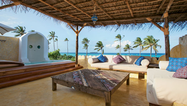 The veranda provides a beautiful view of the ocean.