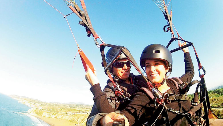 Student travelers go skydiving in Spain, an up-and-coming spring break destination according to StudentUniverse.