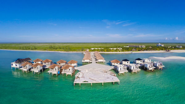 Drone image capturing construction on the Palafitos -- Overwater Bungalows at el Dorado Maroma, a Beachfront Resort, by Karisma. Drone image capturing construction on the Palafitos -- Overwater Bungalows at el Dorado Maroma, a Beachfront Resort, by Karisma.