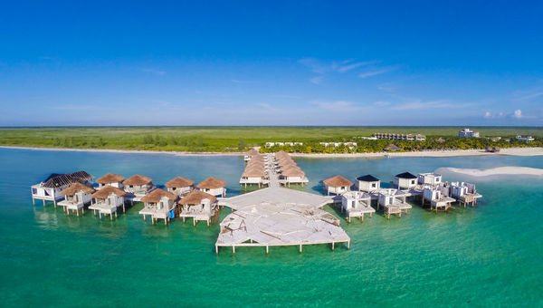 Drone image capturing construction on the Palafitos -- Overwater Bungalows at el Dorado Maroma, a Beachfront Resort, by Karisma. Drone image capturing construction on the Palafitos -- Overwater Bungalows at el Dorado Maroma, a Beachfront Resort, by Karisma.