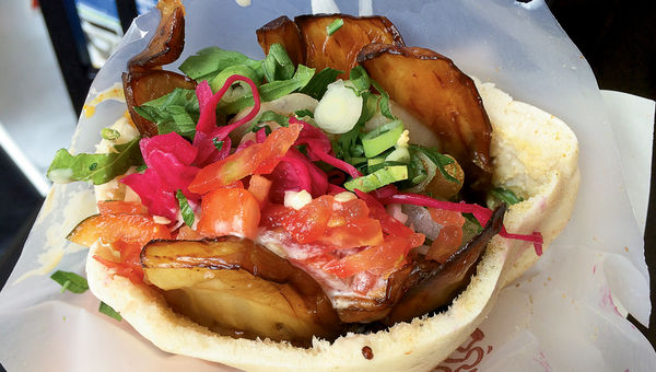 The Sabich sandwich shop near the Carmel Market featured a traditional pita sandwich of fried eggplant and toppings. The Sabich sandwich shop near the Carmel Market featured a traditional pita sandwich of fried eggplant and toppings.