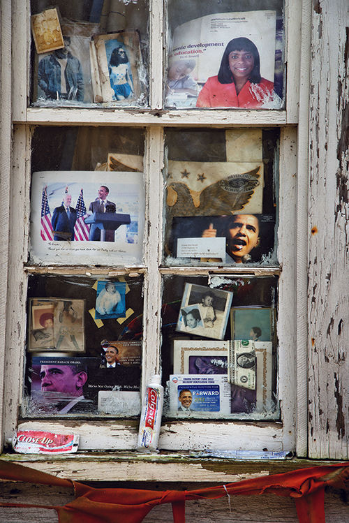 The windows of this old house in Greenville, Miss., are filled with pictures of President Barack Obama. The windows of this old house in Greenville, Miss., are filled with pictures of President Barack Obama.