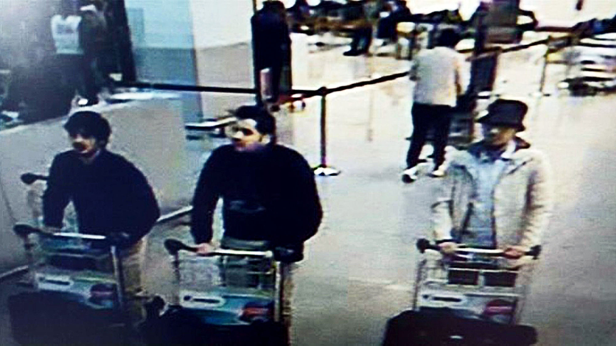 In this image provided by the Belgian Federal Police are three men suspected of taking part in the Brussels airport attack. The man at right is being sought by police and the two others were probably suicide bombers.