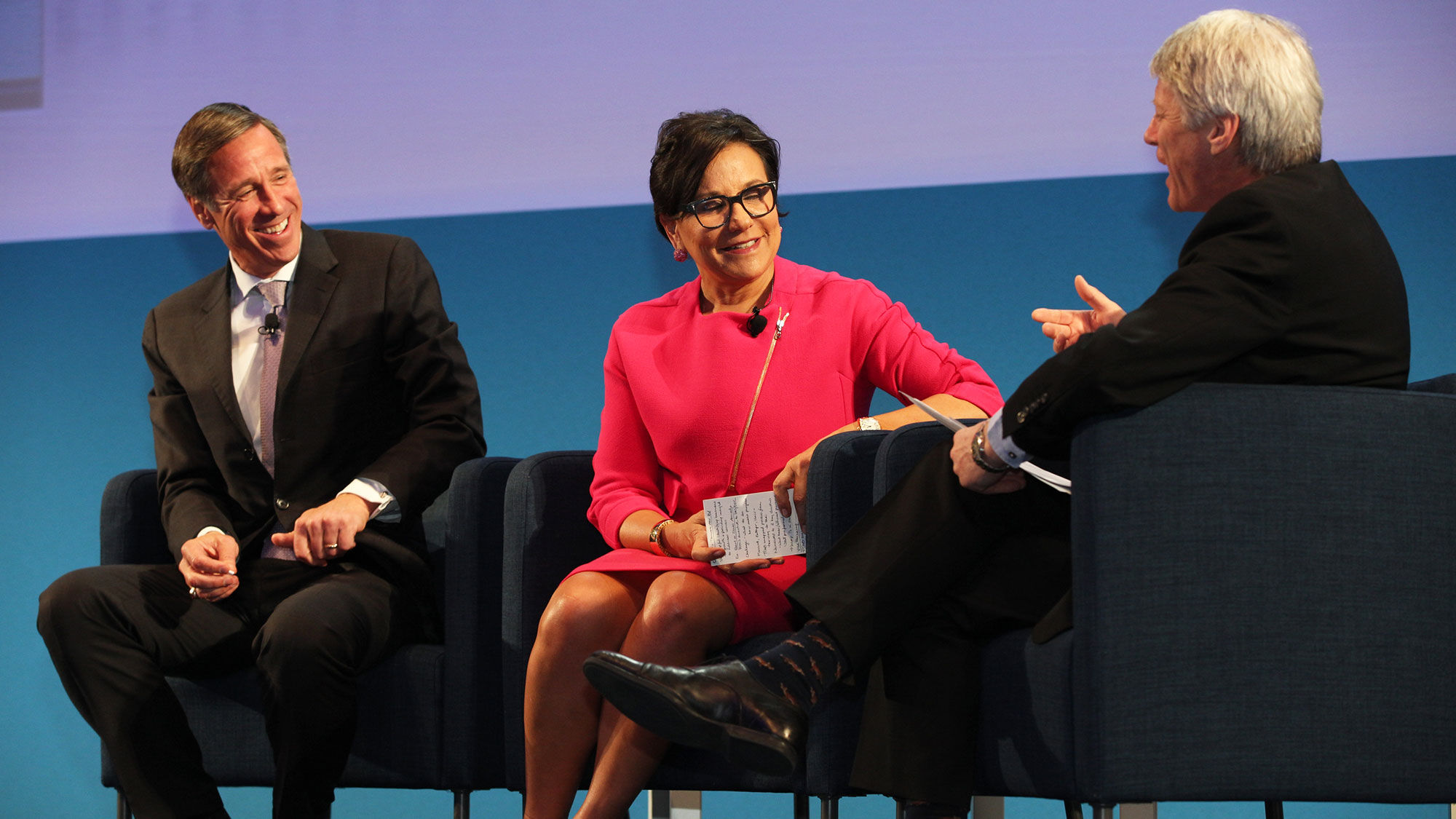 From left, Arne Sorenson, Penny Pritzker and moderator Nick Ross on stage at the WTTC Global Summit.