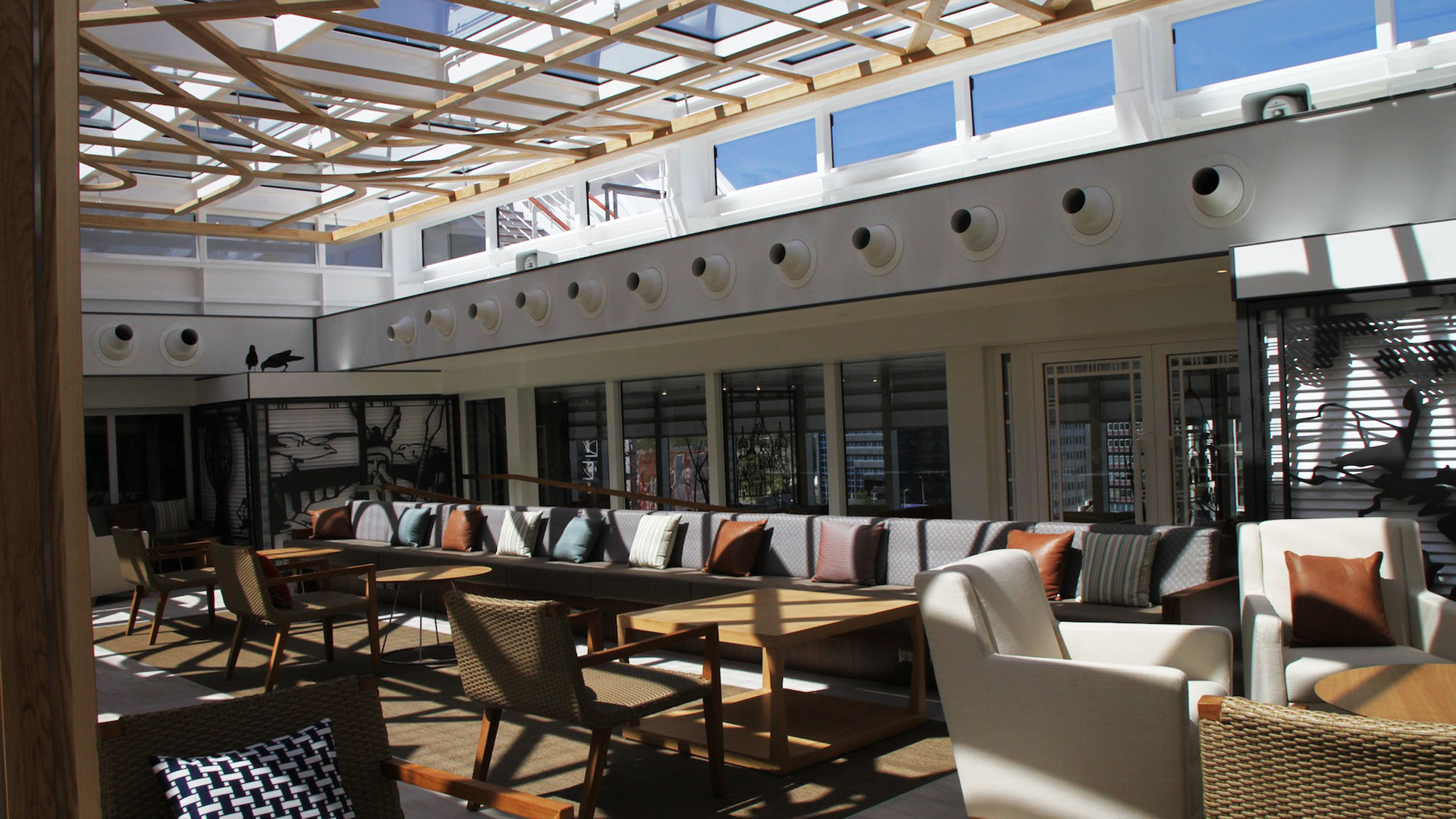 The Viking Sea's Wintergarden, and indoor/outdoor lounge space.