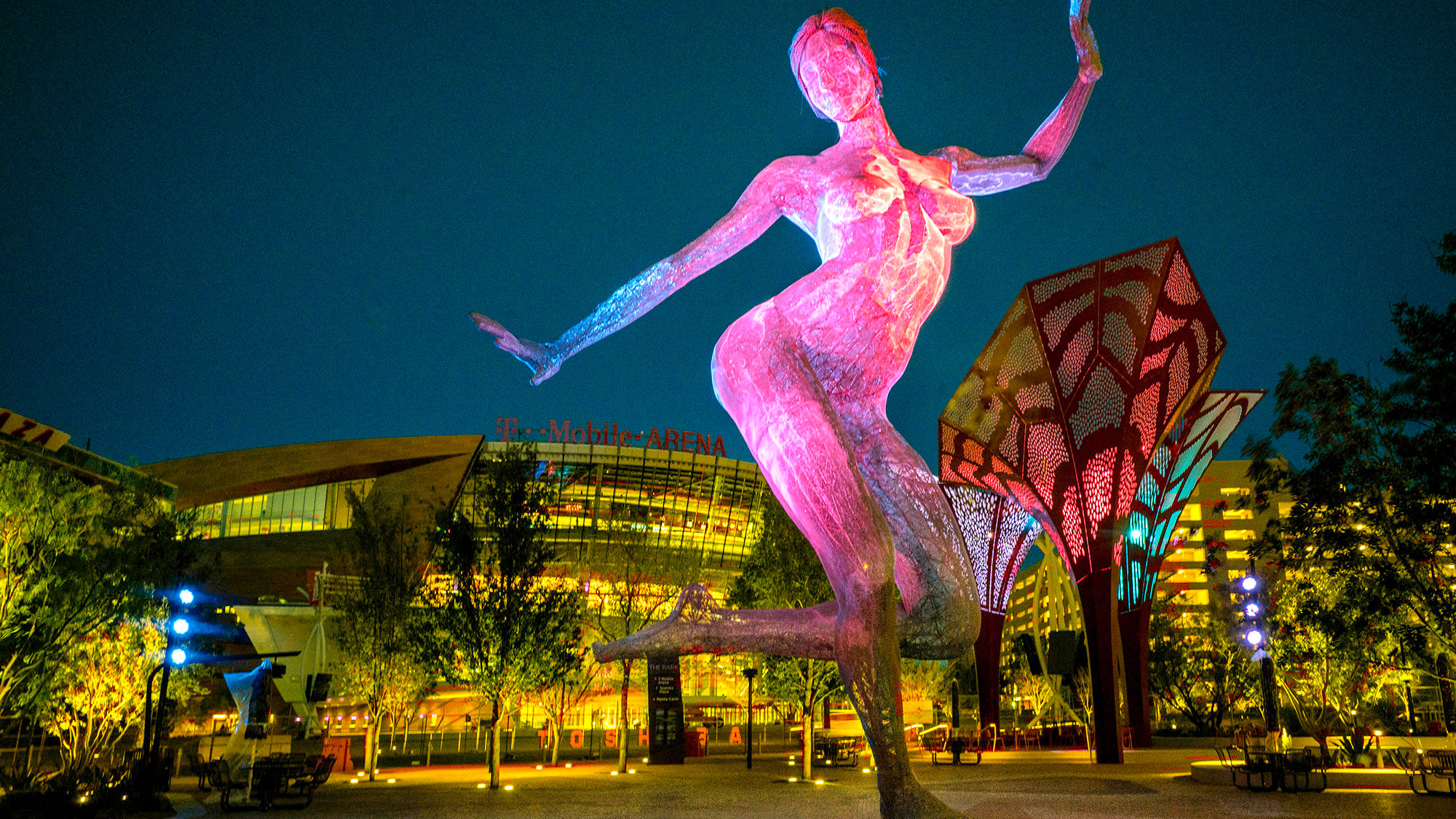 An open-air dining and entertainment destination on the Strip, the Park includes desert landscaping, a water feature and the sculpture "Bliss Dance" by Marco Cochrane.