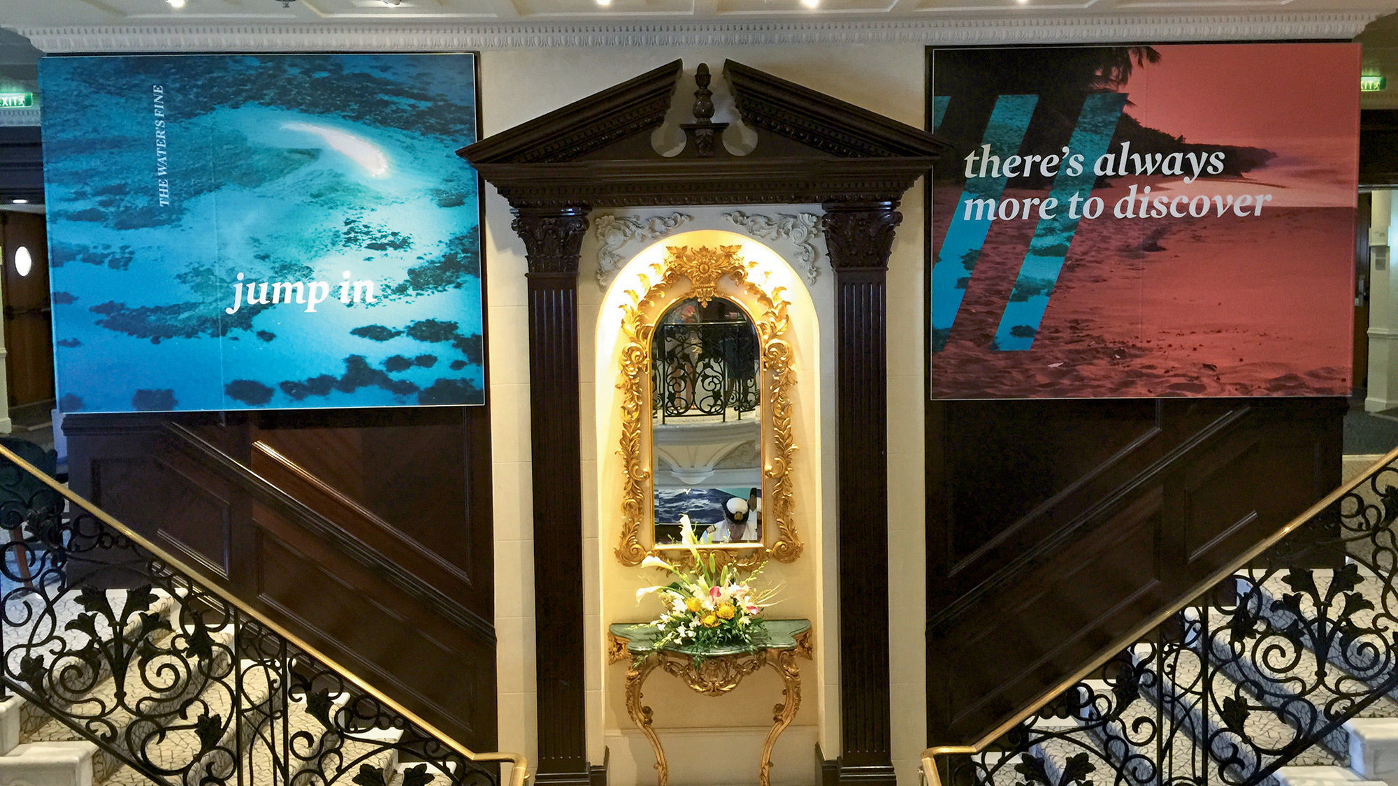 The central staircase on Adonia shows how Fathom elements have been overlaid onto the decor of the ship.