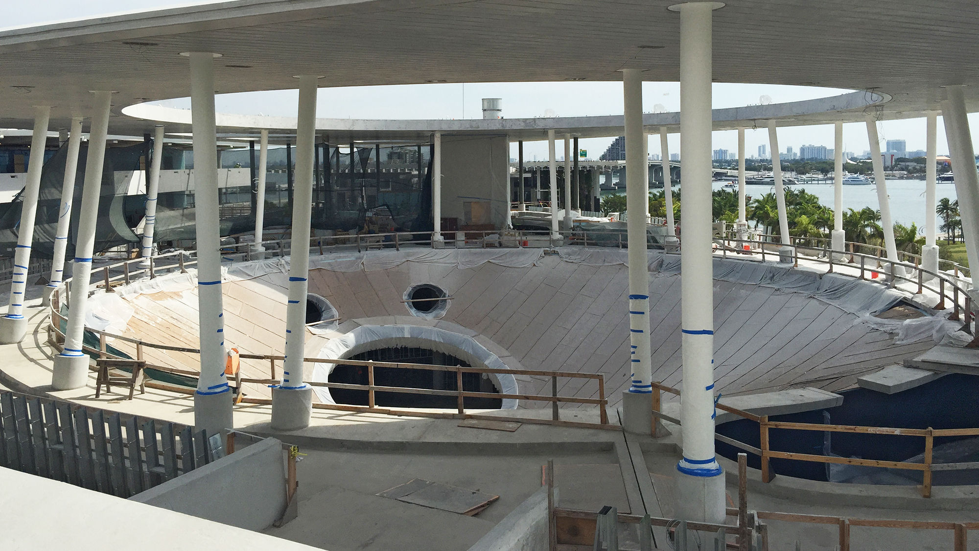 Construction on a 500,000-gallon, martini glass-shaped tank populated by hammerhead sharks to be featured in the the Living Core Aquarium attraction.